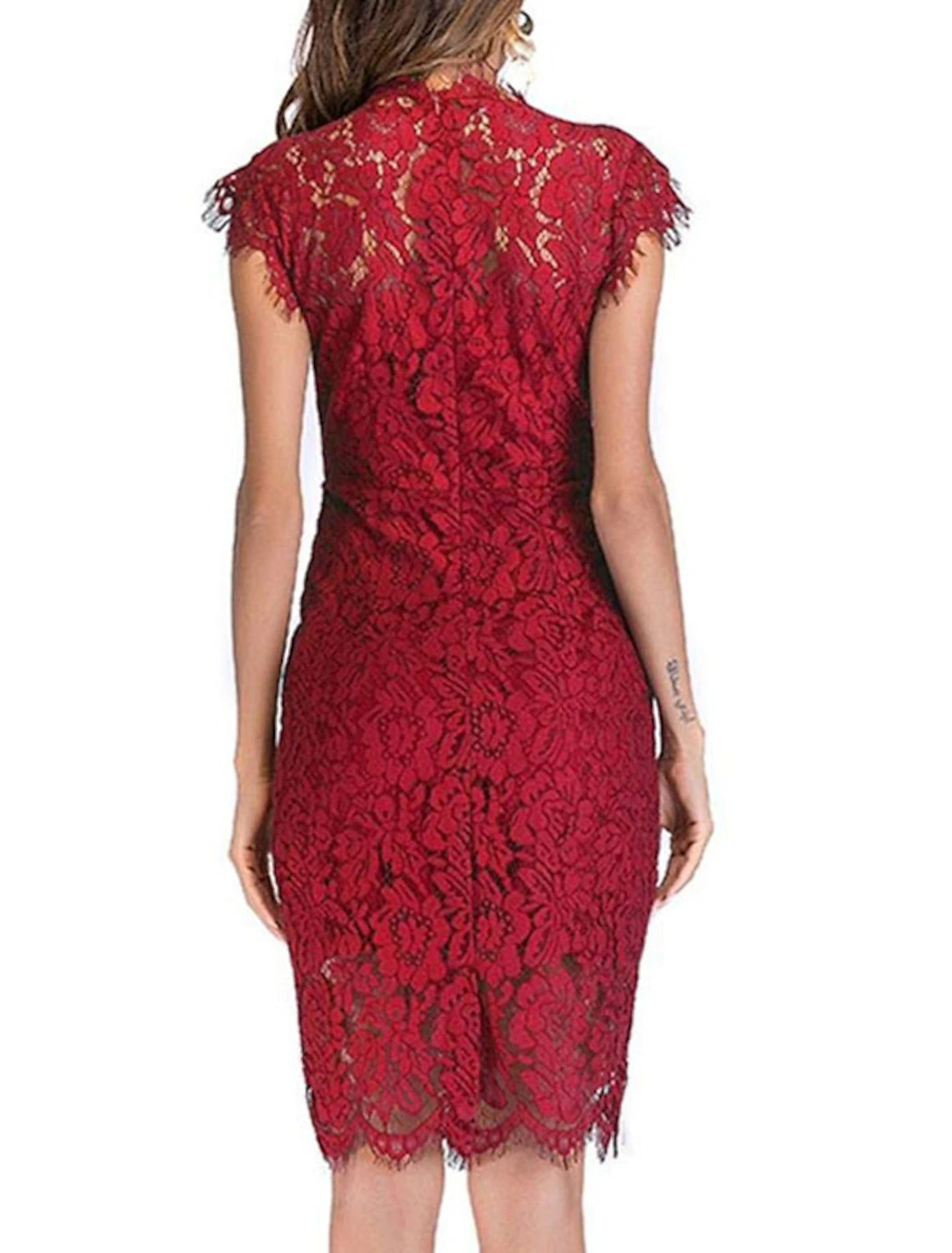 Stylish woman posing in a pure color bodycon sheath dress for special occasions.