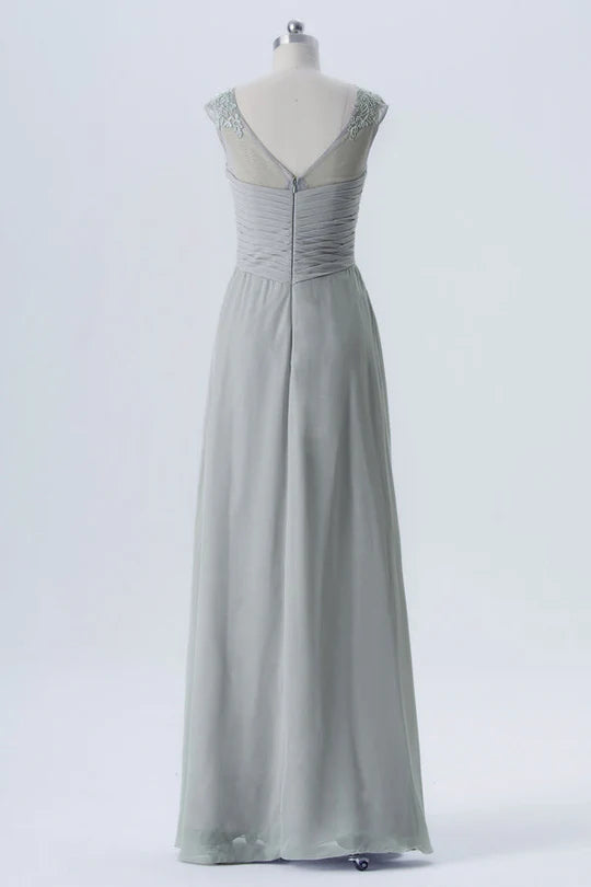 Back view of the grey chiffon dress, highlighting the elegant backless design.