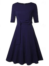 Woman wearing an elegant tie-front belted crew neck midi dress.