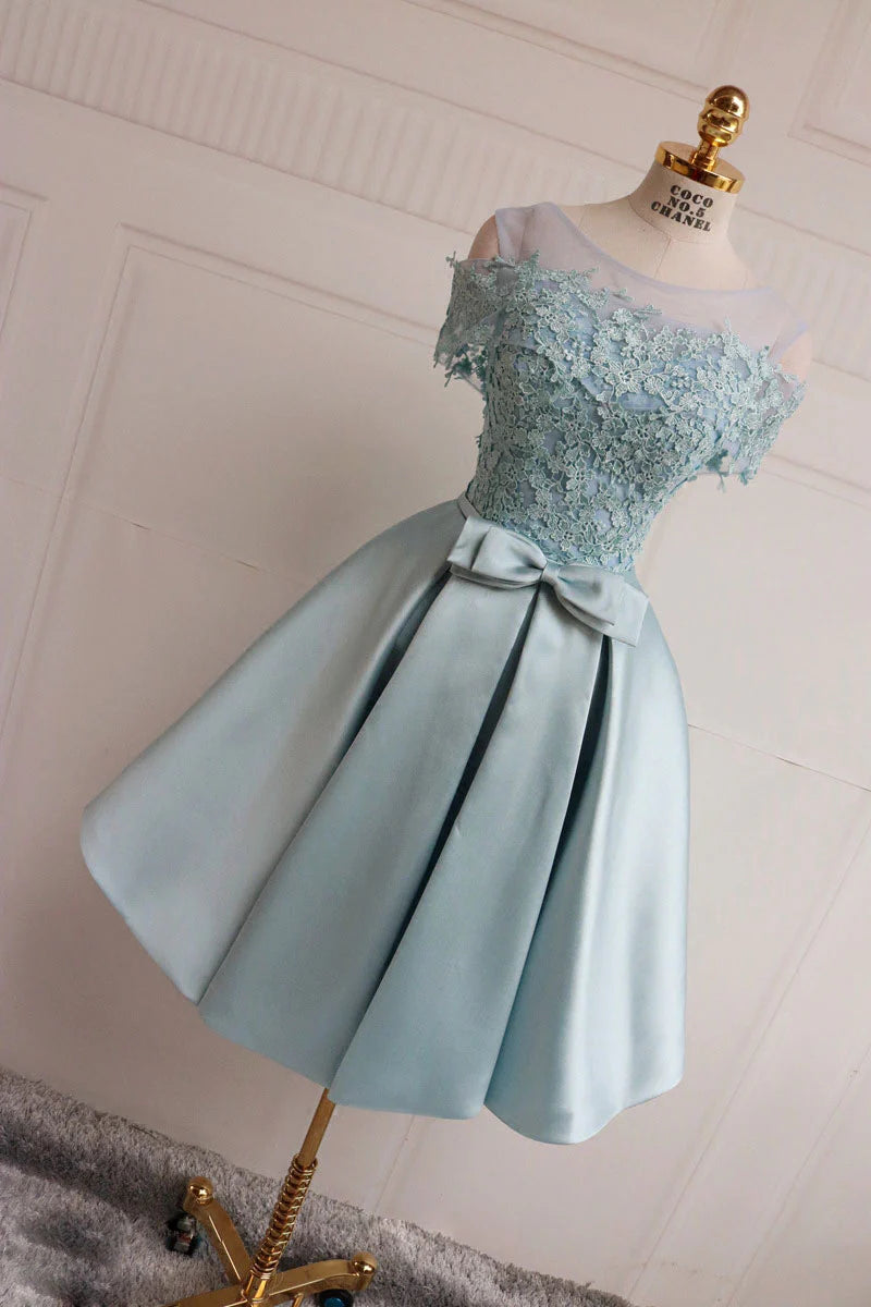 Back view of the blue lace short bridesmaid dress, highlighting the A-line silhouette.