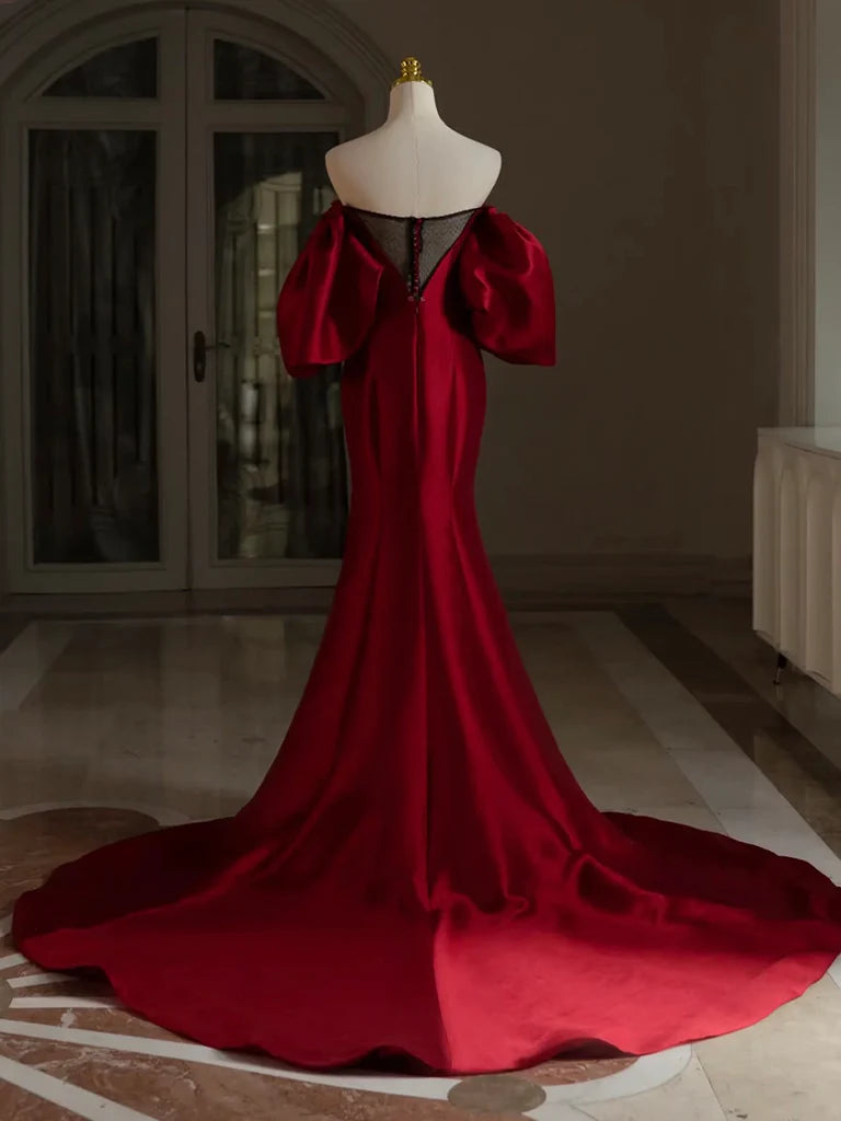 Side view of the elegant burgundy A-line formal gown.