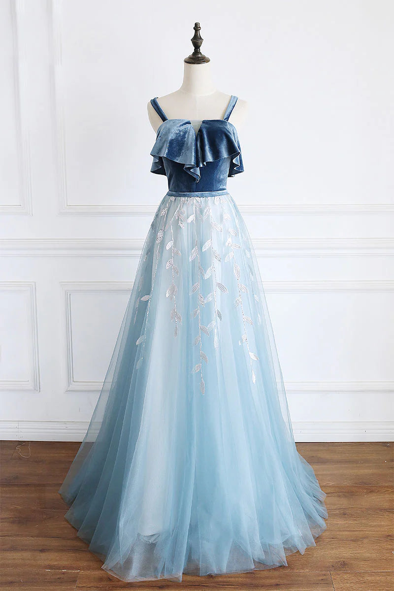 Elegant blue tulle lace long prom dress on a model.