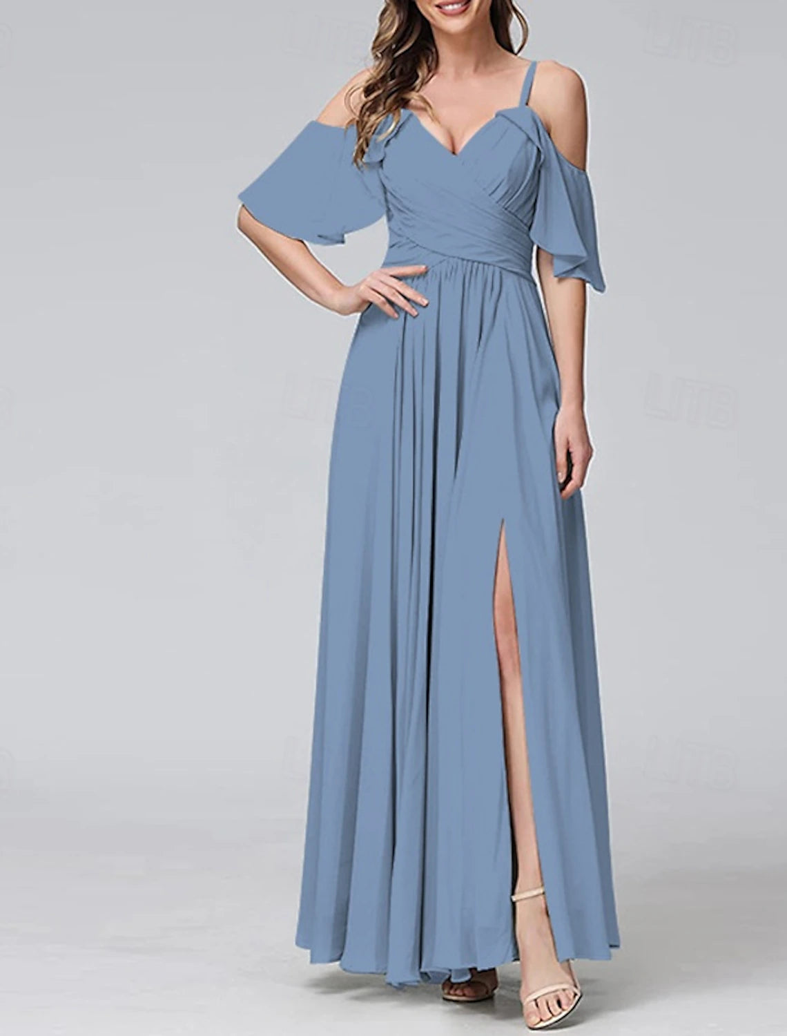 Woman wearing an elegant V-neck short sleeve maxi dress, front view.