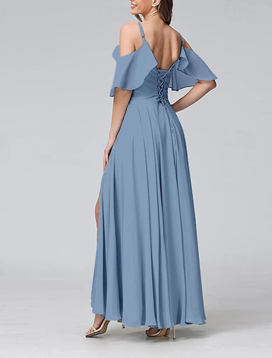Woman wearing an elegant V-neck short sleeve maxi dress, back view.