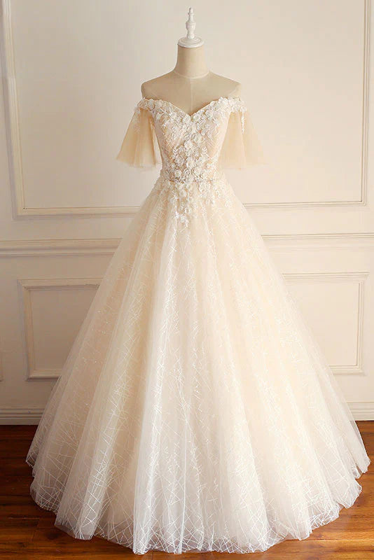 Elegant champagne tulle and lace long prom or wedding dress.
