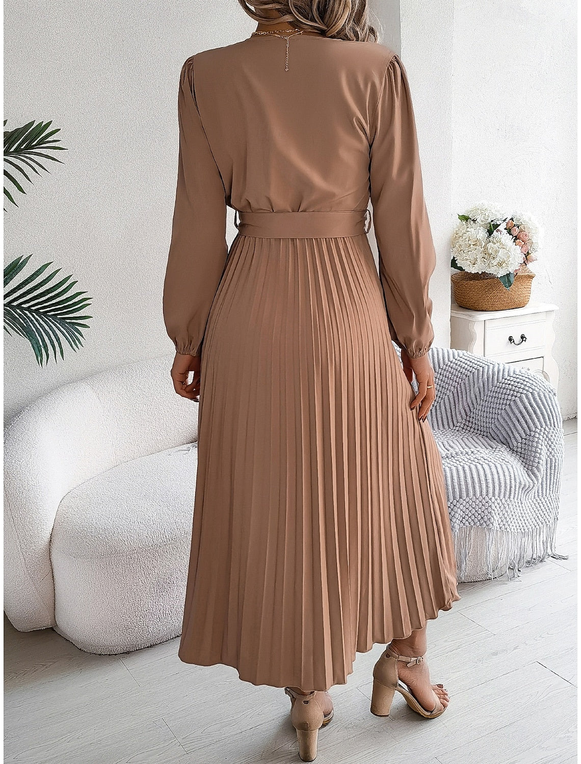 Elegant vintage pleated V-neck long sleeve mini dress with high waist detail.