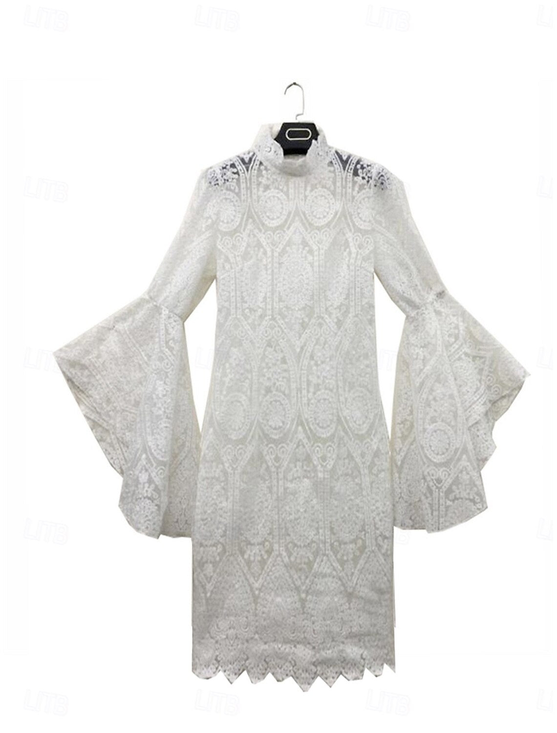 Close-up view of the intricate white lace and embroidery details on the mini dress.