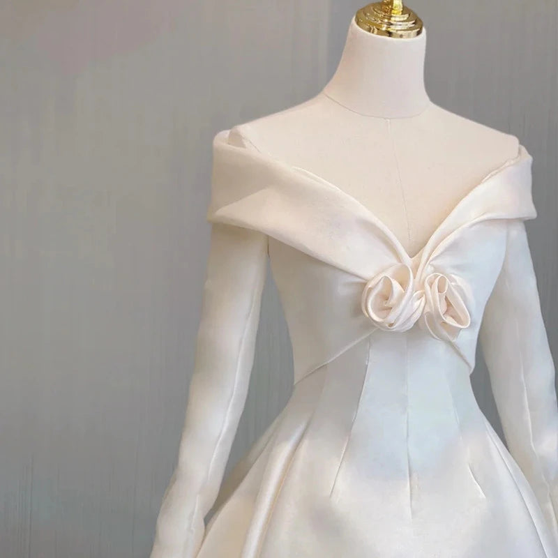 Elegant A-Line Off-Shoulder Long Sleeve 3D Flower Satin Ivory Floor-Length Wedding Dress