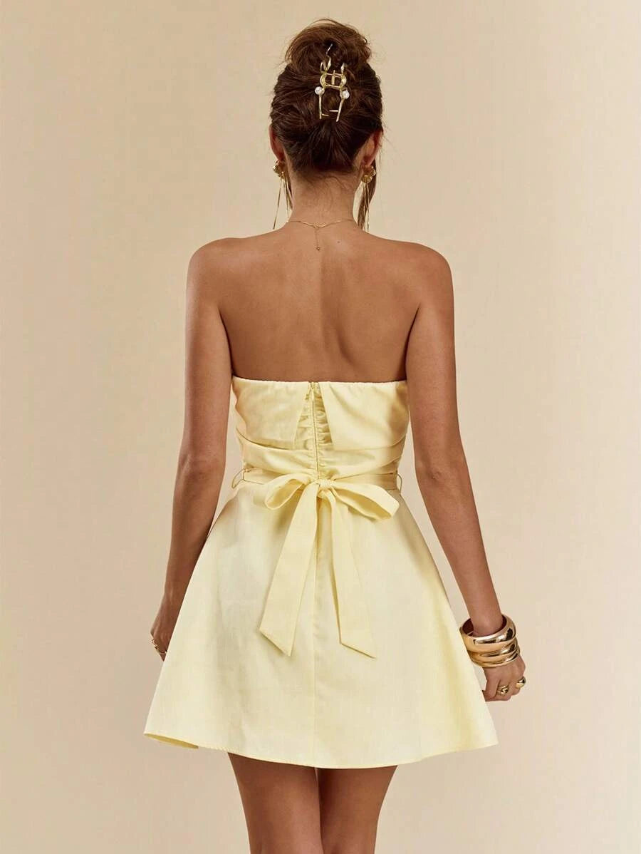 Elegant A-Line Strapless Pleated Tie-Back Light Yellow Mini Homecoming Dress