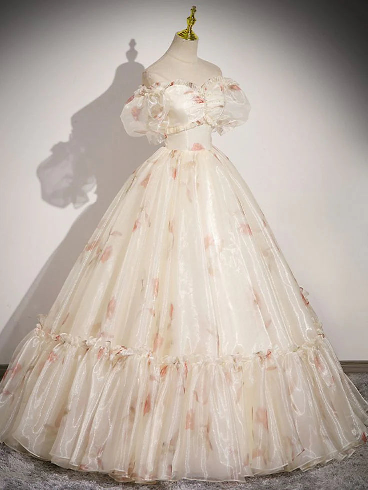 Woman wearing a floral chiffon A-line evening dress, front view.