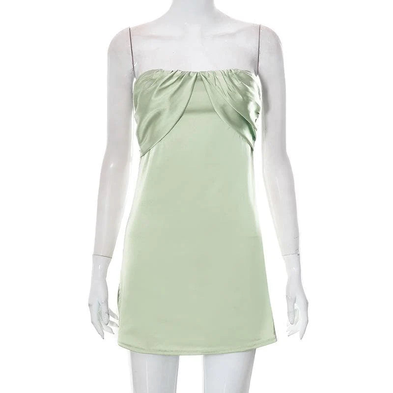 Back view of the sage green ruched homecoming dress.