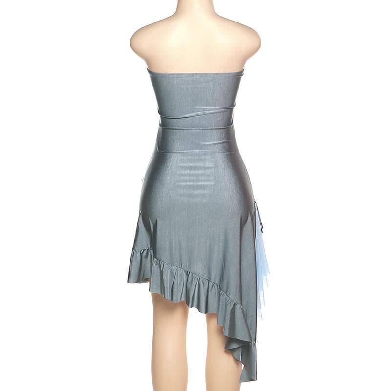 Close-up of the shimmering grey fabric and strapless bodice of the dress.