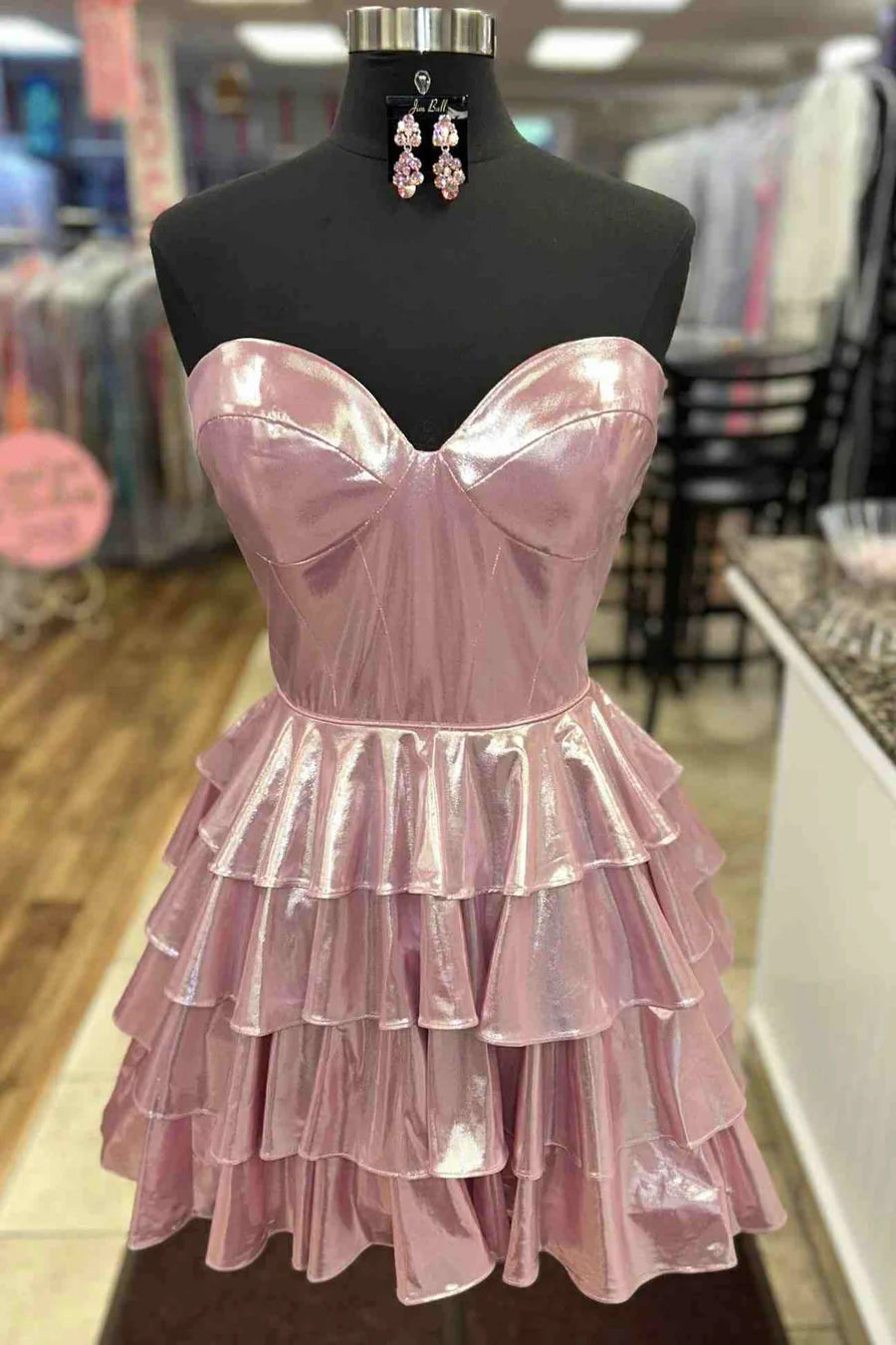 Back view of the A-line metallic off-shoulder dress.