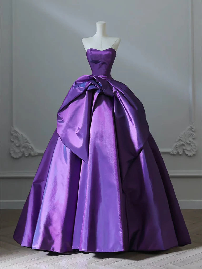 Model wearing a long A-line sweetheart neck satin purple prom dress.