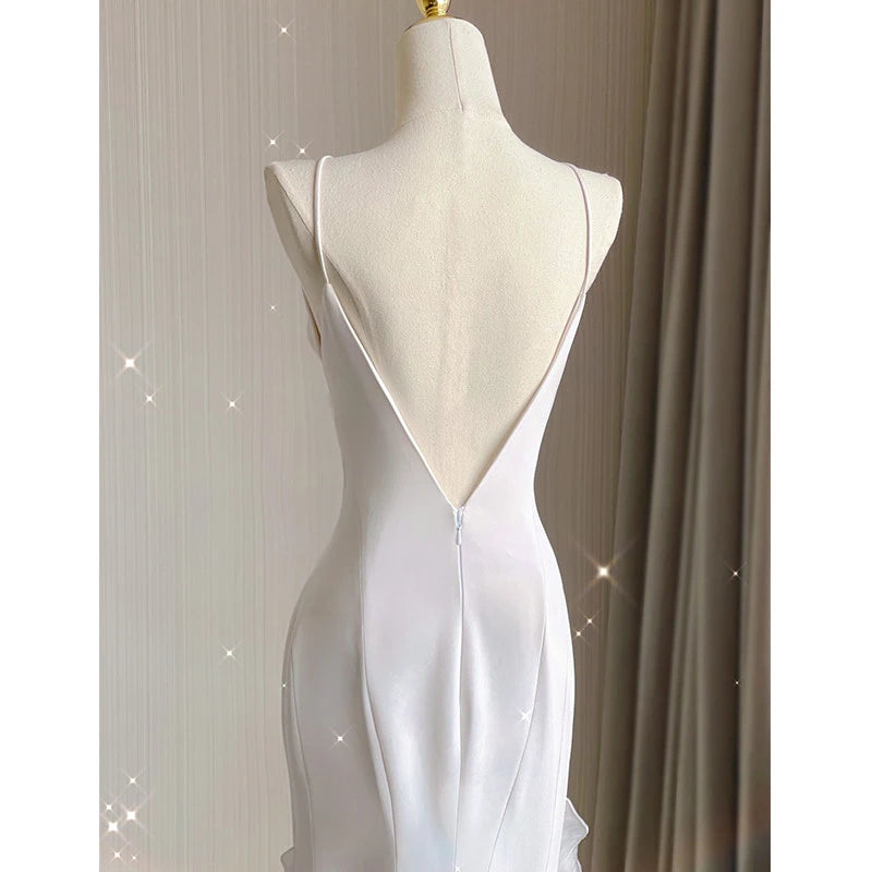 Stunning Mermaid Spaghetti Straps Ruffled Backless Ivory Floor-Length Wedding Dress