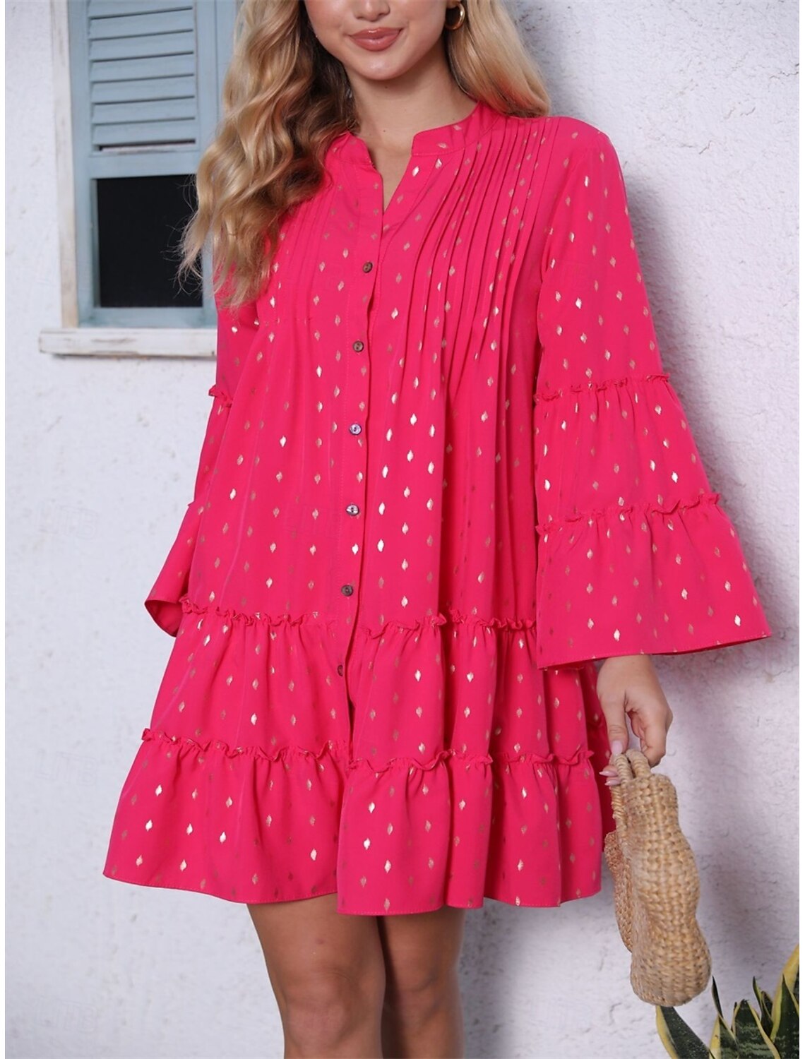 Woman in a magenta V-neck mini dress, showcasing the comfortable loose fit.