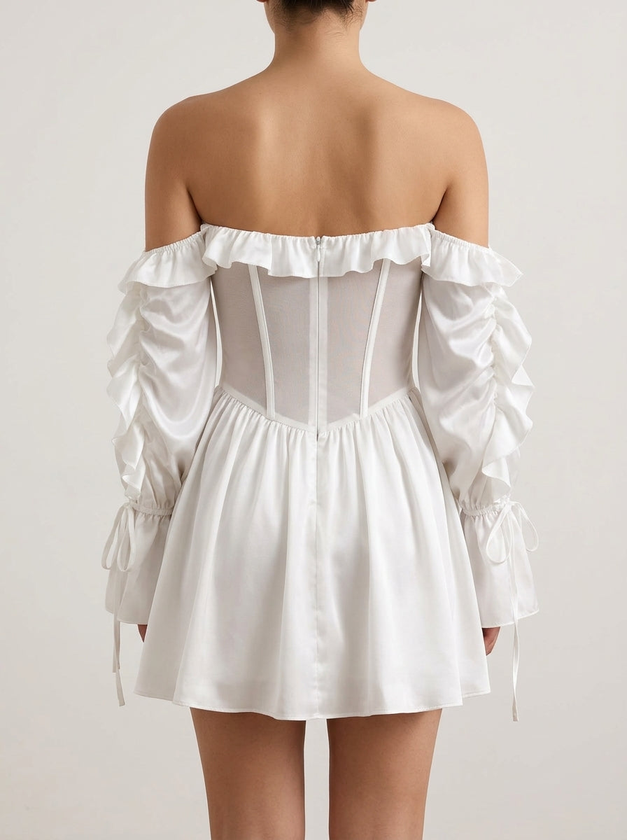 Model in a white off-shoulder mini dress, showing ruffled long sleeves and structured corset detail.
