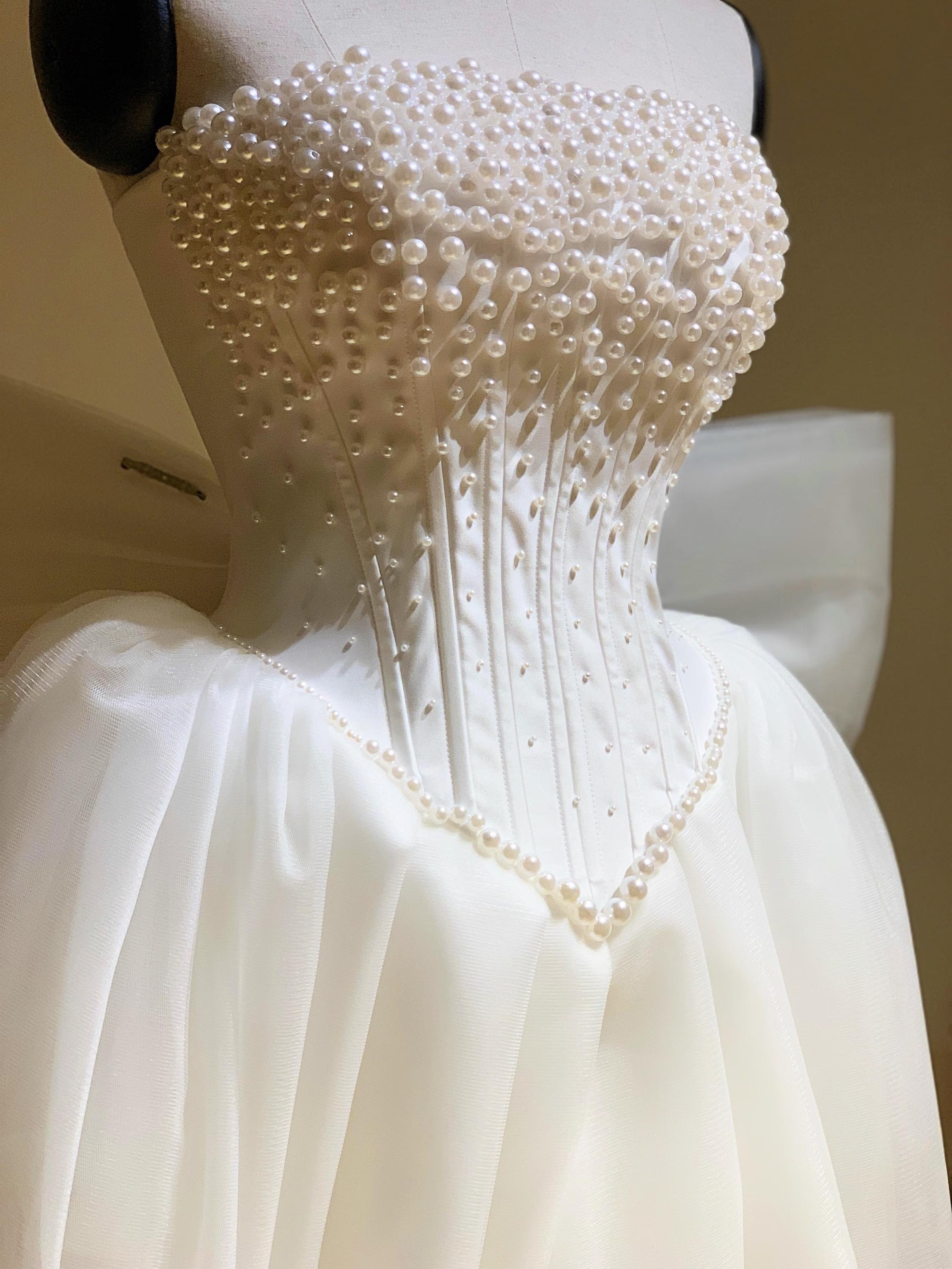 Full view of the white strapless A-line mini dress for homecoming.