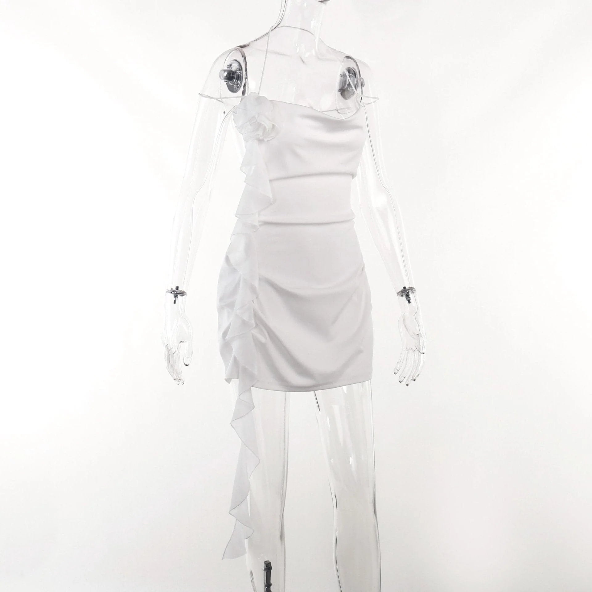 Full length view of a model posing in the white halter cowl neck mini dress.