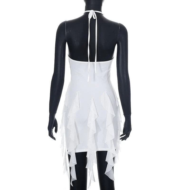 Close-up of the white halter dress neckline with a keyhole cutout.